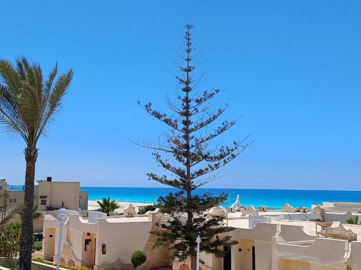 Borg El Arab Beach Resort Buitenkant foto A view of the Mediterranean from the city of Hammamet